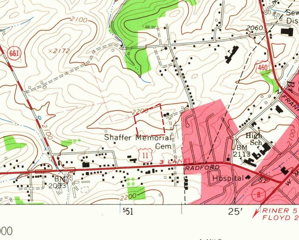 Detail of a 1965 topographic map: a small dashed red outline on an open hilltop above the label Shaffer Memorial Cem, a red highway marked U.S. 11 and 3 Lane along the bottom, the pink built-up area of town to the east with the labels Hospital and High Sch.